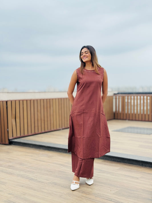 Chocolate brown sleeveless Hand embroidered kurta with matching palazzo.