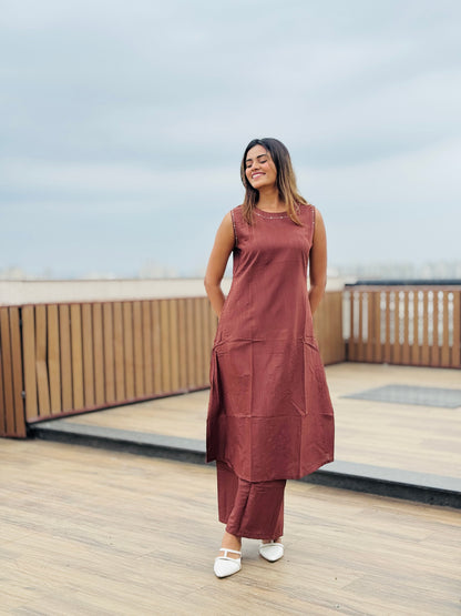 Chocolate brown sleeveless Hand embroidered kurta with matching palazzo.