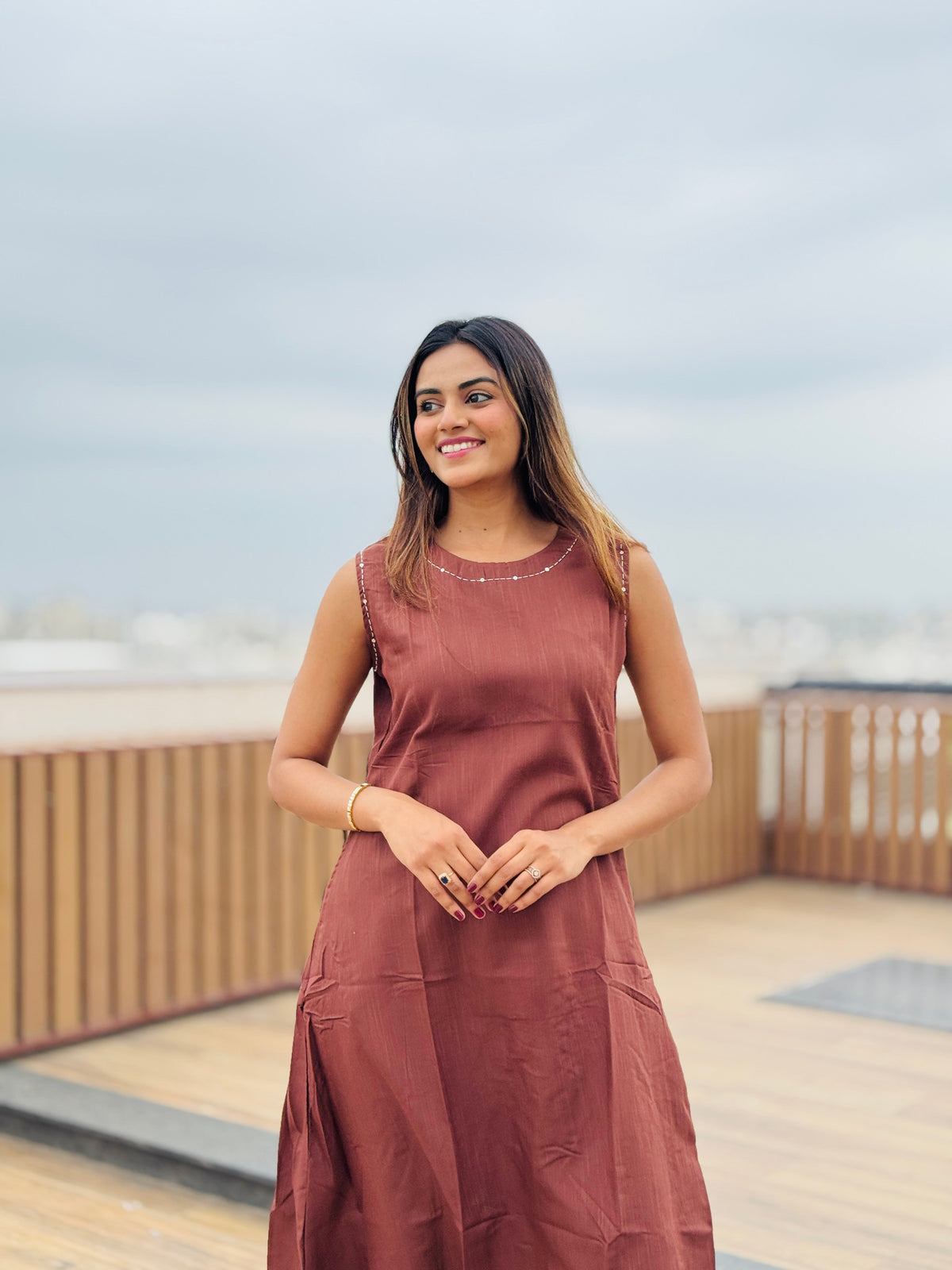 Chocolate brown sleeveless Hand embroidered kurta with matching palazzo.
