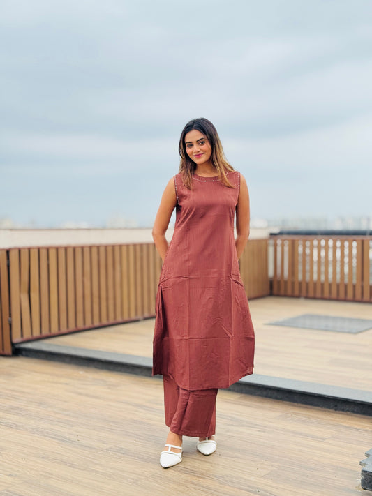 Chocolate brown sleeveless Hand embroidered kurta with matching palazzo.
